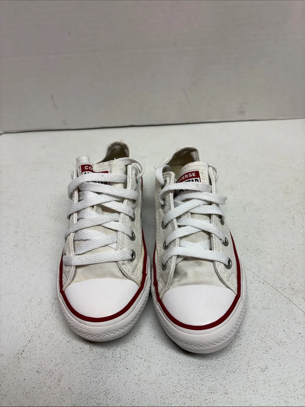 Converse White Low-Top Sneakers with Red Stripe
